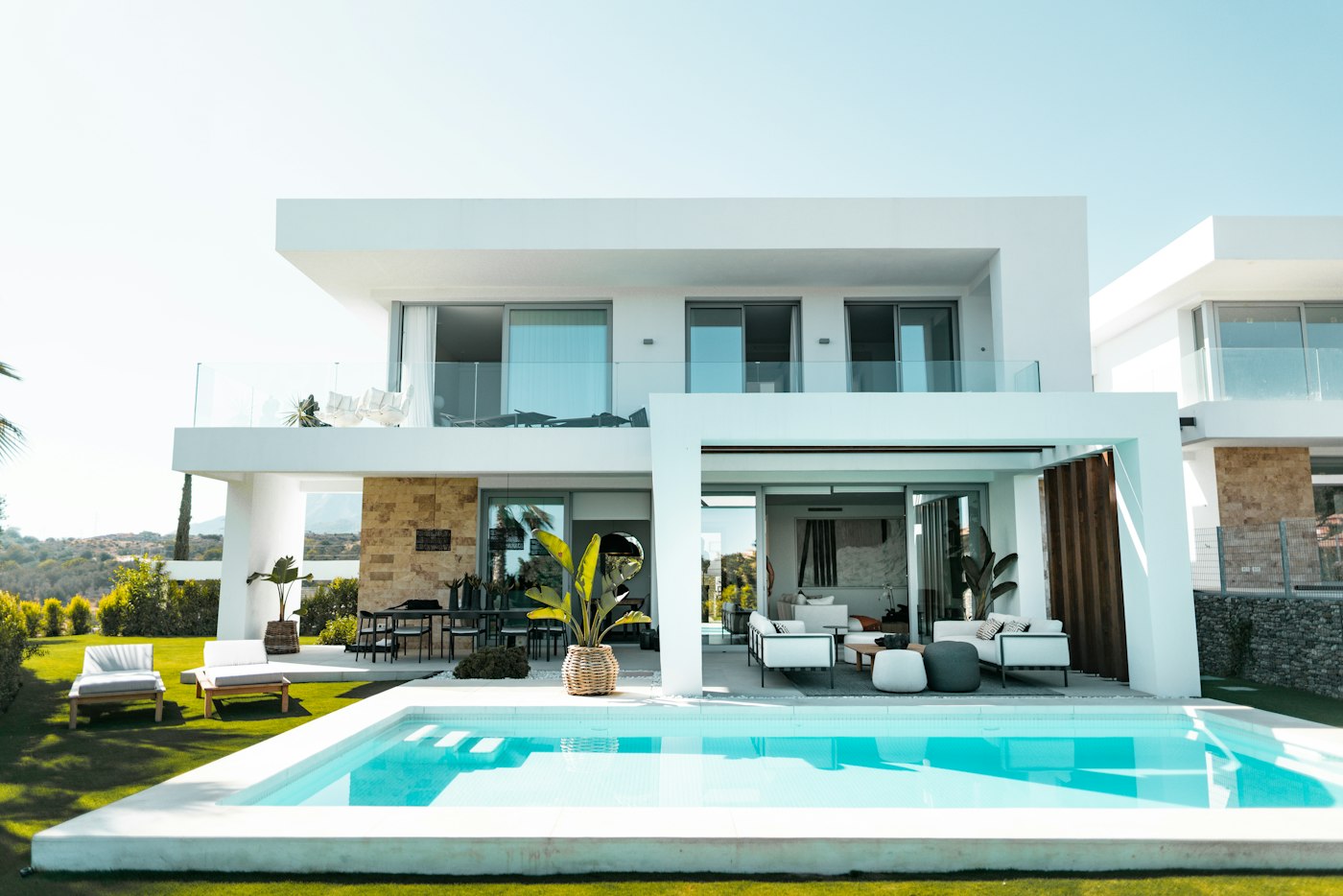 White villa exterior with pool